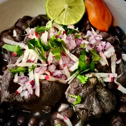 Frijol con puerco dish, with beans, pork, lemon and habanero