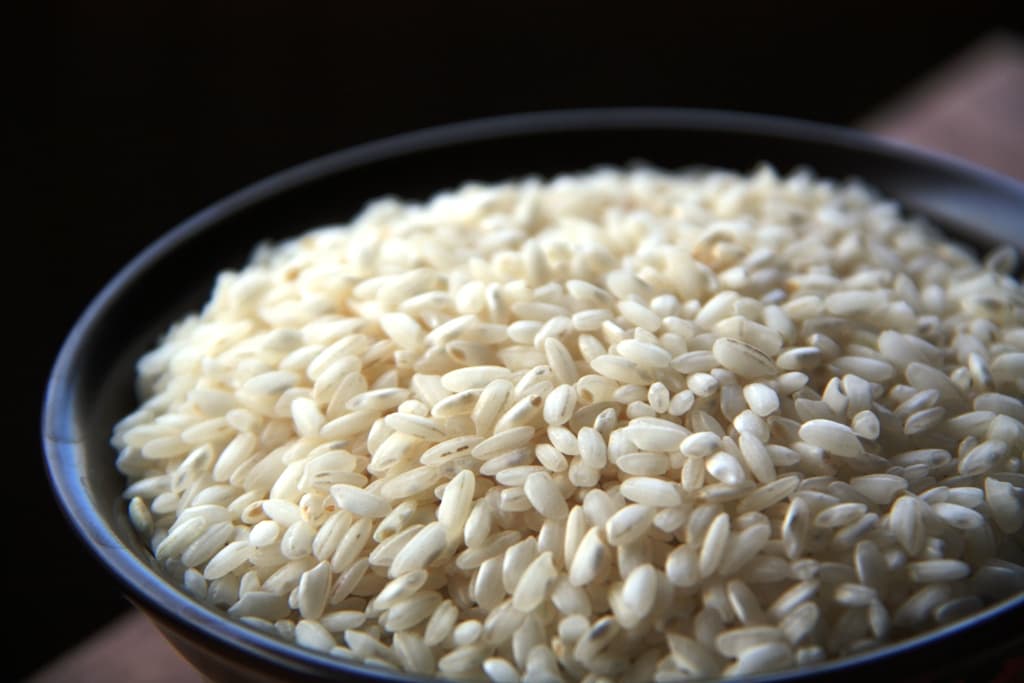 Plate with uncooked rice